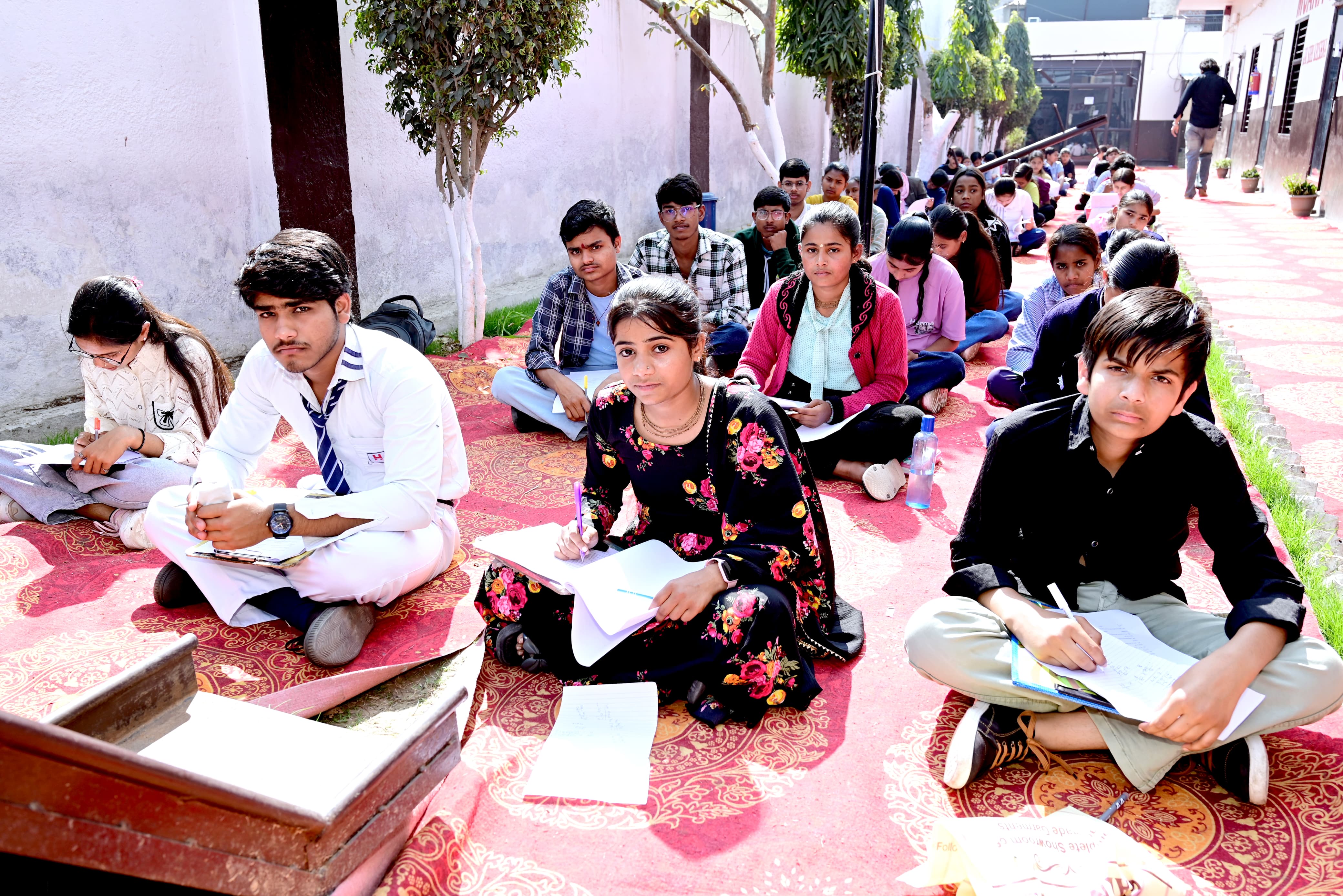 Senior students scholarship test outdoors